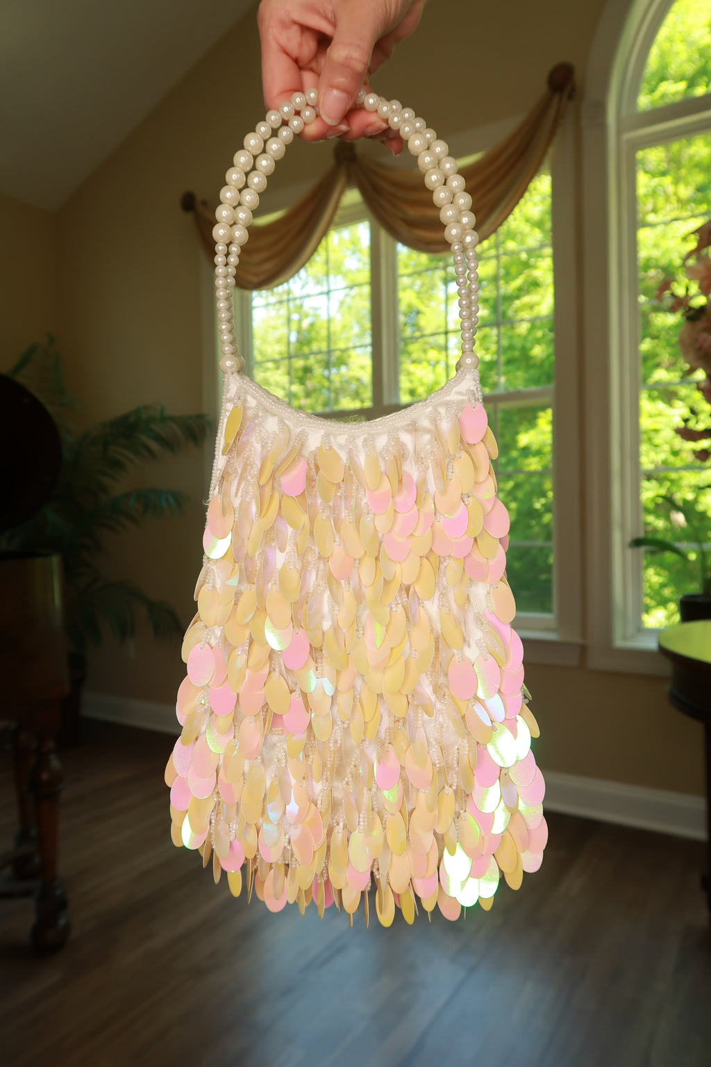 Vintage pastel paillette sequin pearl beaded handle shoulder bag by Elektra Vintage, showcasing colorful embellishments and elegant design.