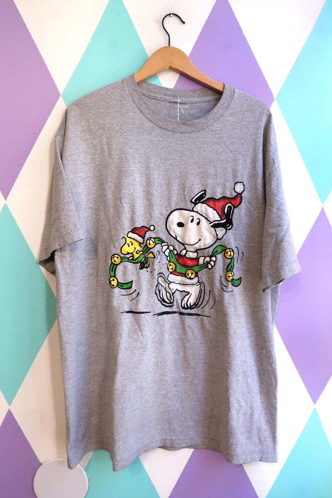 Vintage 2000s Christmas Snoopy Graphic T-Shirt with Holiday Bell Garland Design