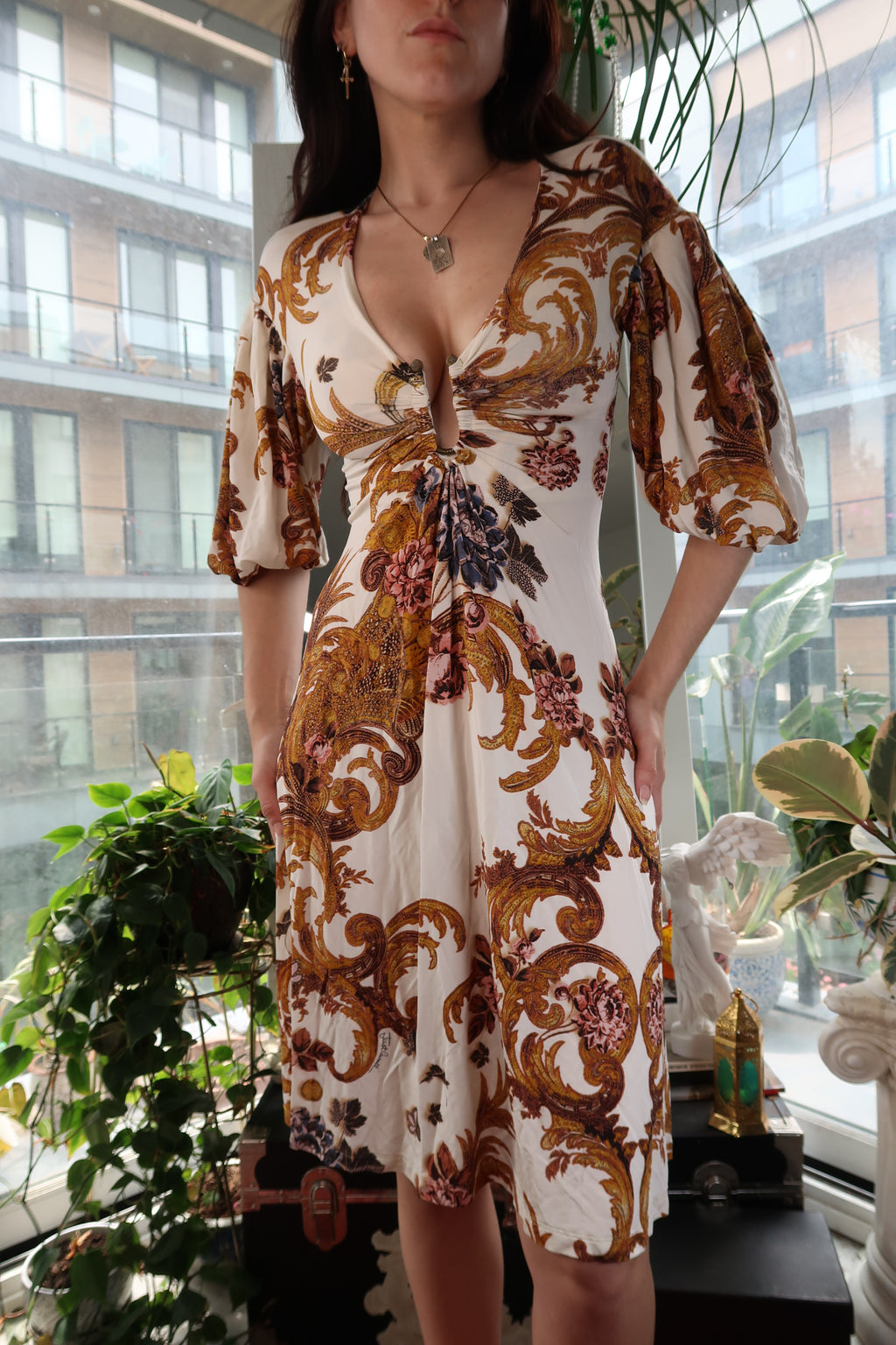 Vintage Elektra Vintage Just Cavalli baroque print dress with deep V neckline and puff sleeves, showcasing elegant fashion design.
