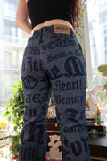 NWT Vintage Moschino Jeans – Allover Rock n Roll Print Denim Pants