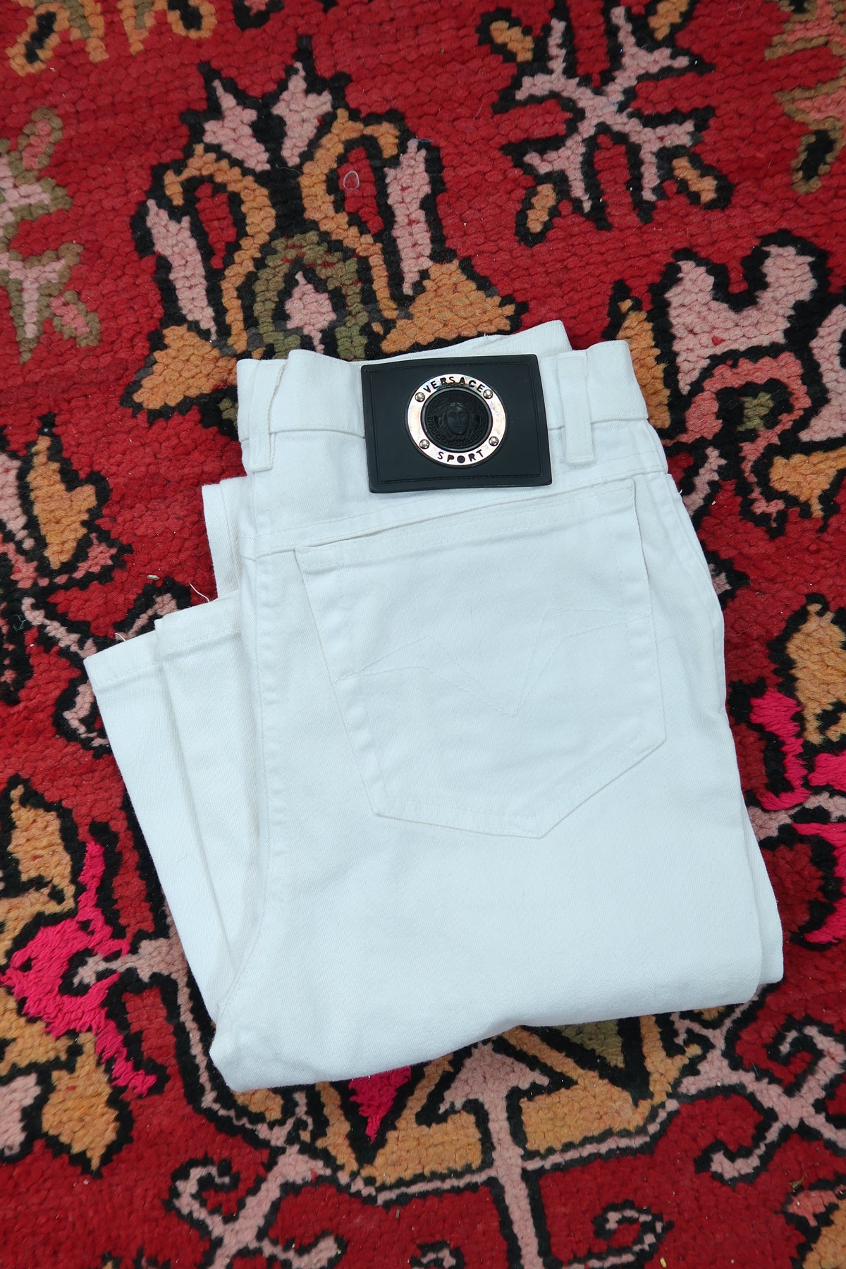 Elektra Vintage women's slim bootcut white jeans with vintage Versace style, made in Italy, featuring a classic denim design.