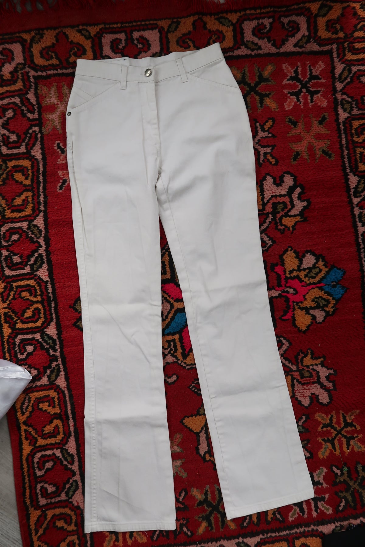 Elektra Vintage women's slim bootcut white jeans with vintage Versace style, made in Italy, showcasing classic denim design.