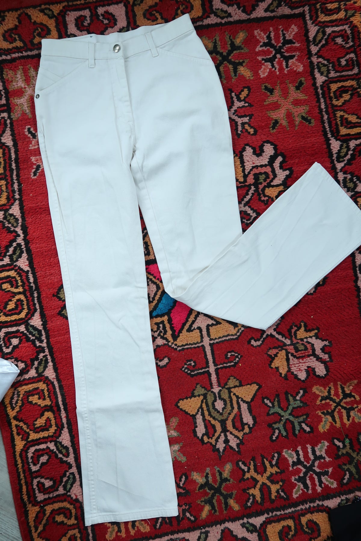 Elektra Vintage white slim bootcut jeans for women, Versace Sport style, made in Italy, featuring classic denim fabric and tailored fit.