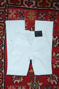 Vintage Versace Sport Slim Bootcut white jeans for women, made in Italy, by Elektra Vintage, showcased on a model.
