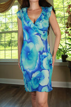 Load image into Gallery viewer, Vintage 2000s Elektra Vintage blue floral mesh midi dress displayed on a hanger, showcasing its elegant floral pattern and sheer fabric.
