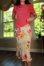 Load image into Gallery viewer, Elektra Vintage vintage silk cowl neck top and floral bias cut midi skirt two-piece dress set displayed on a hanger.
