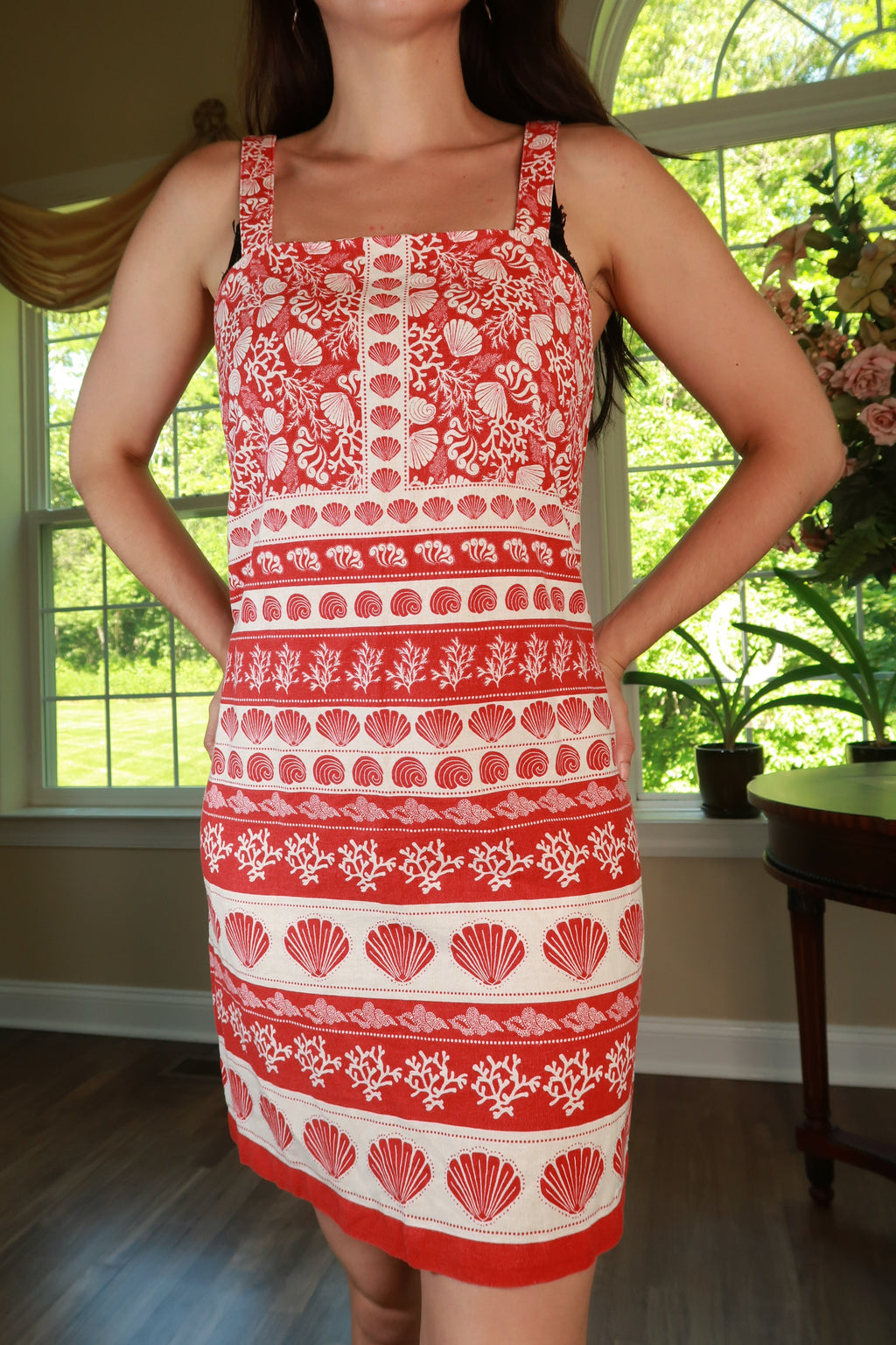 Elektra Vintage red and white coastal seashell print sundress featuring a flowy design and summery style.