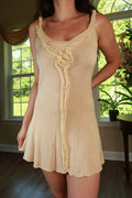 Vintage 2000s Nine West silk trim ruffle knit sweater dress by Elektra Vintage, featuring ruffles and a fitted silhouette.