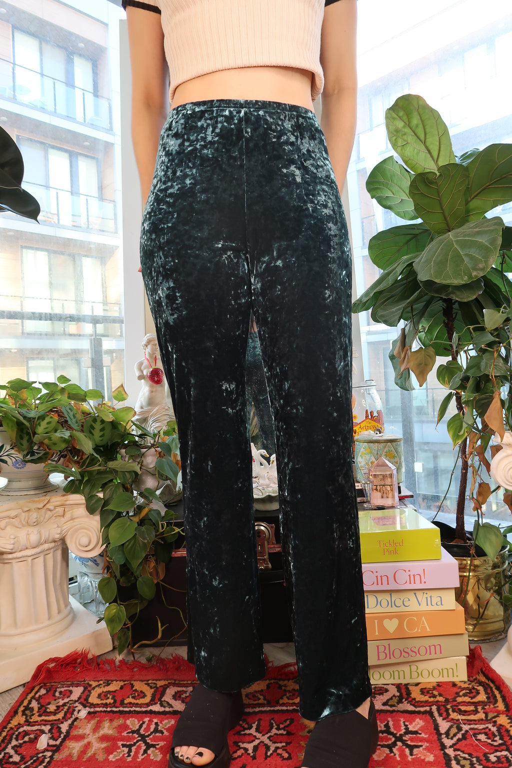 Vintage 90s teal crushed velvet women's pants from Elektra Vintage, showcasing the textured fabric and relaxed fit.
