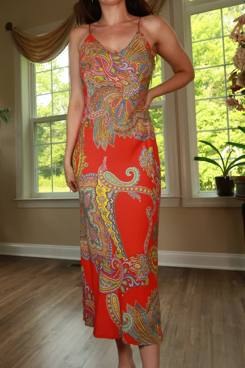 Red paisley print maxi dress by Elektra Vintage featuring a flowing silhouette and bohemian style.