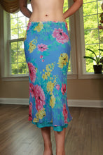 Load image into Gallery viewer, Vintage 2000s Elektra Vintage silk floral bias cut midi skirt displayed on a hanger.
