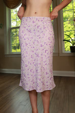 Load image into Gallery viewer, Vintage 2000s XOXO lavender floral bias cut midi skirt from Elektra Vintage, featuring a flowy, feminine design with a floral pattern.
