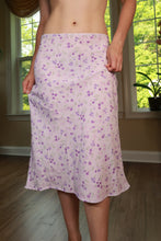 Load image into Gallery viewer, Vintage 2000s XOXO lavender floral bias cut midi skirt by Elektra Vintage, featuring a flowy silhouette and feminine floral pattern.
