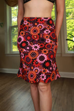 Load image into Gallery viewer, Vintage 2000s Charlotte Russe floral midi skirt by Elektra Vintage, featuring a mod floral pattern and classic A-line silhouette.
