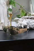 Moschino Gold Shield Sunglasses – Embossed Logo Visor Shades