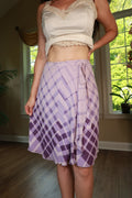 Vintage 2000s lavender silk plaid wrap midi skirt by Elektra Vintage, showcasing the soft fabric and stylish design.