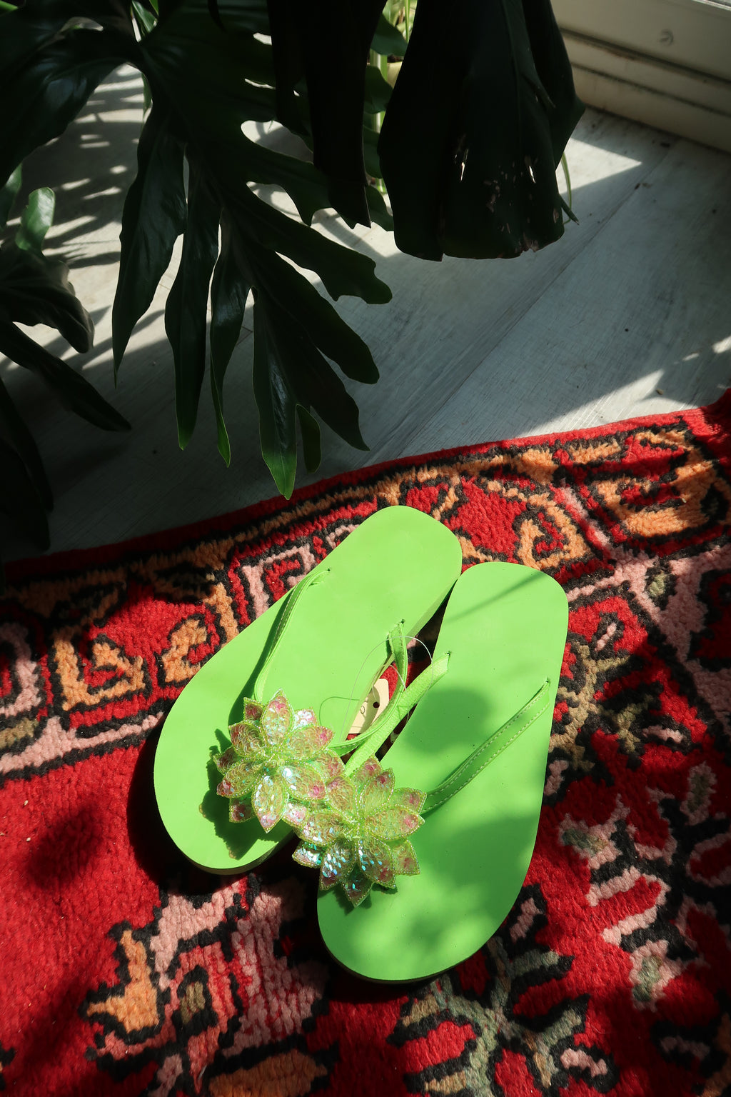 Lime green sequin flower flip flops by Elektra Vintage, vintage Y2K glitter sandals with colorful floral embellishments.
