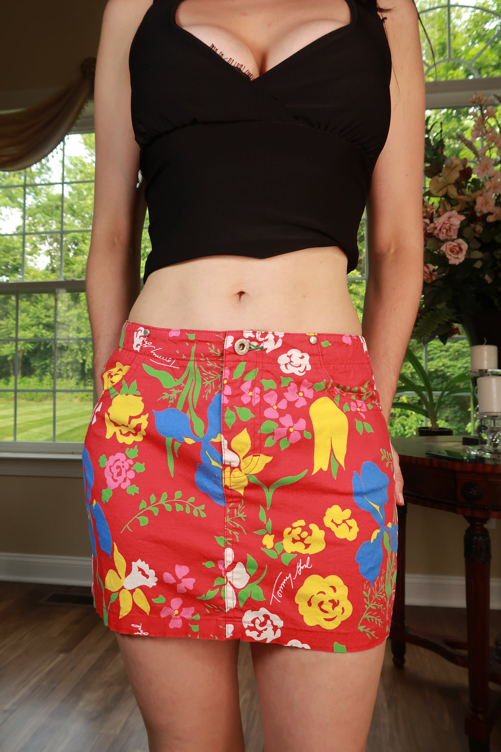 Vintage Y2K Tommy Jeans tropical floral print mini skirt by Elektra Vintage, showcasing vibrant floral pattern and classic denim fabric.