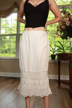 Load image into Gallery viewer, Vintage Y2K white crochet lace hem midi skirt by Elektra Vintage, featuring intricate lace detailing and a flowing midi length.
