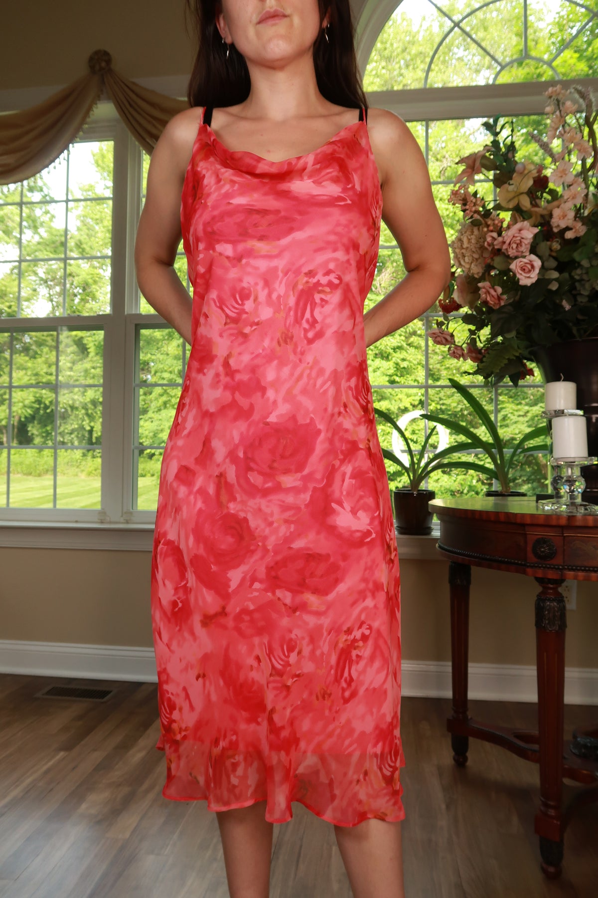Vintage Y2K pink floral watercolor slip midi dress from Elektra Vintage, shown hanging with delicate floral print and soft fabric.
