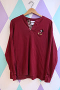 Vintage 2000s Disney Mickey Mouse Henley long sleeve men's shirt by Elektra Vintage, featuring classic Mickey Mouse design in soft fabric.