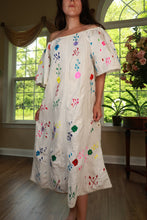 Load image into Gallery viewer, Vintage white off-shoulder embroidered peasant midi dress by Elektra Vintage, featuring intricate embroidery and flowing fabric.
