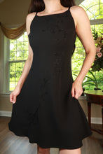 Load image into Gallery viewer, Vintage black beaded floral slip dress by Elektra Vintage, featuring intricate beadwork and a sleek, elegant silhouette.
