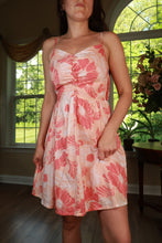 Load image into Gallery viewer, Vintage Y2K Guess pink floral babydoll mini dress by Elektra Vintage, featuring a fitted bodice and flowy skirt.
