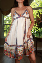 Load image into Gallery viewer, Vintage Elektra Y2K Boho border print babydoll mini dress shown with flowy fabric and bohemian style details.
