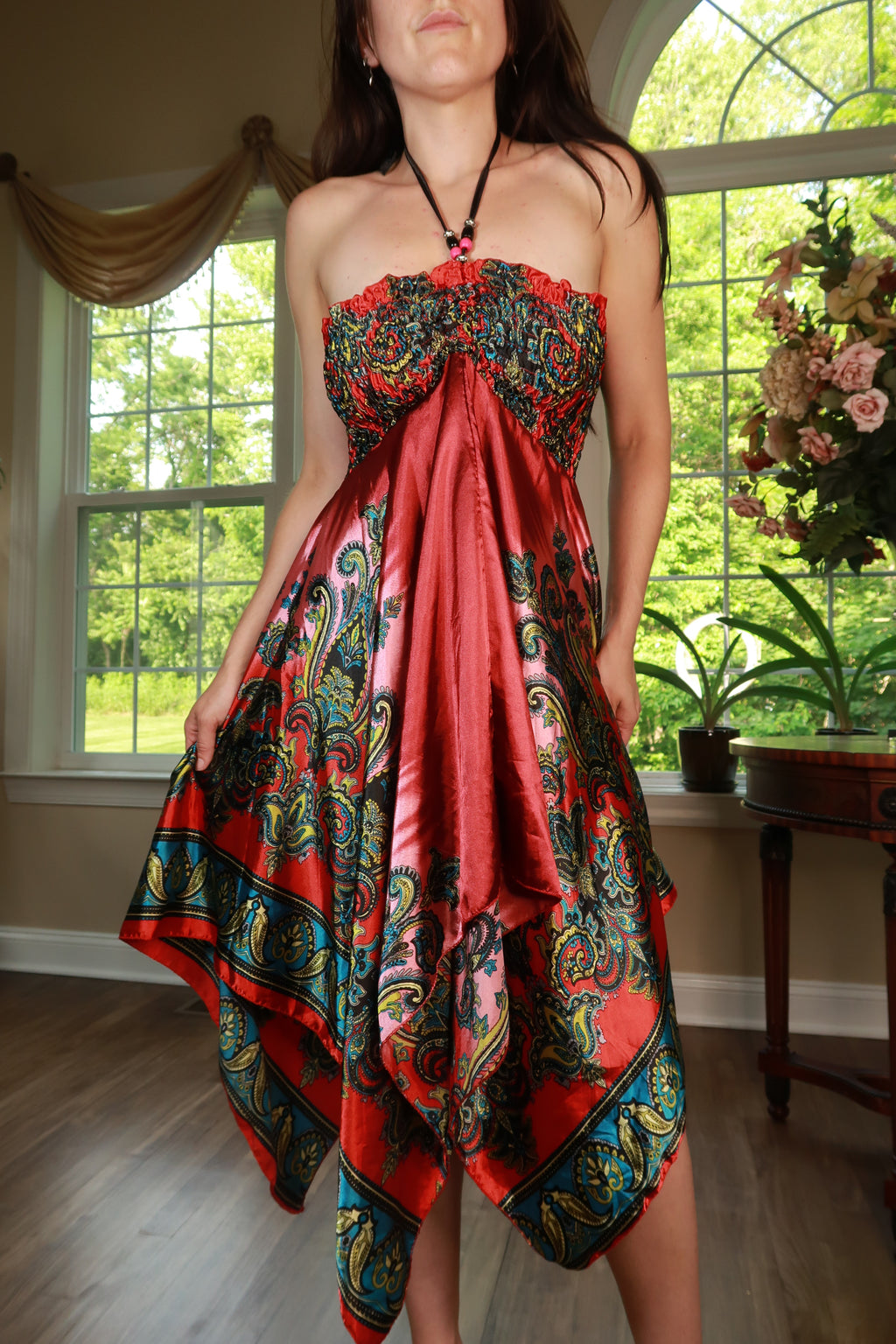Vintage Elektra Vintage silk paisley halter dress with handkerchief hem, featuring a retro style and intricate paisley pattern.
