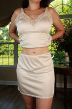Load image into Gallery viewer, Vintage ivory satin lace trim slip mini skirt by Elektra Vintage, featuring delicate lace details and a smooth satin finish.
