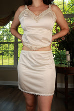 Load image into Gallery viewer, Vintage ivory satin lace trim slip mini skirt by Elektra Vintage, featuring delicate lace details and smooth satin fabric.
