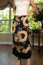 Load image into Gallery viewer, Elektra Vintage floral print maxi skirt with vintage Japanese-inspired fan design, flowing fabric, and vibrant colors.
