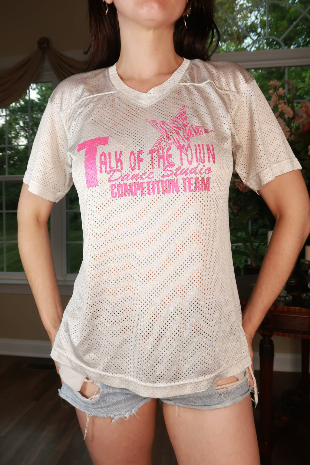 Elektra Vintage women's Y2K dance team mesh graphic jersey tee, featuring retro-inspired design and bold print on lightweight fabric.