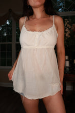 Load image into Gallery viewer, White vintage Y2K empire waist babydoll cami top for women from Elektra Vintage, featuring a feminine empire silhouette and delicate straps.
