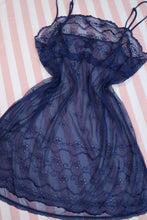 Load image into Gallery viewer, Navy blue sheer mesh slip dress with spaghetti straps and lace trim, styled as a babydoll lingerie from Elektra Vintage.
