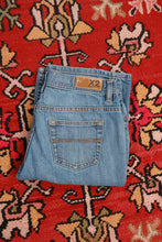 Load image into Gallery viewer, Vintage Express Y2K Medium Wash Flare Jeans
