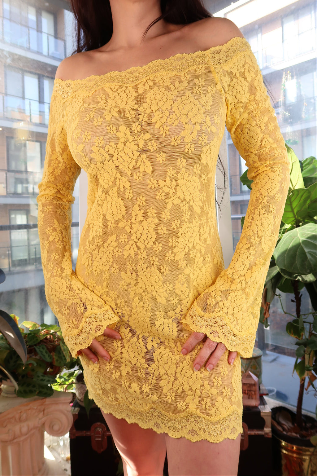 Elektra Vintage yellow lace off-shoulder dress displayed on a mannequin against a neutral backdrop.