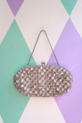 Vintage silver sequin beaded handbag by Elektra Vintage, showing intricate beadwork and shimmering sequins on a classic bag.