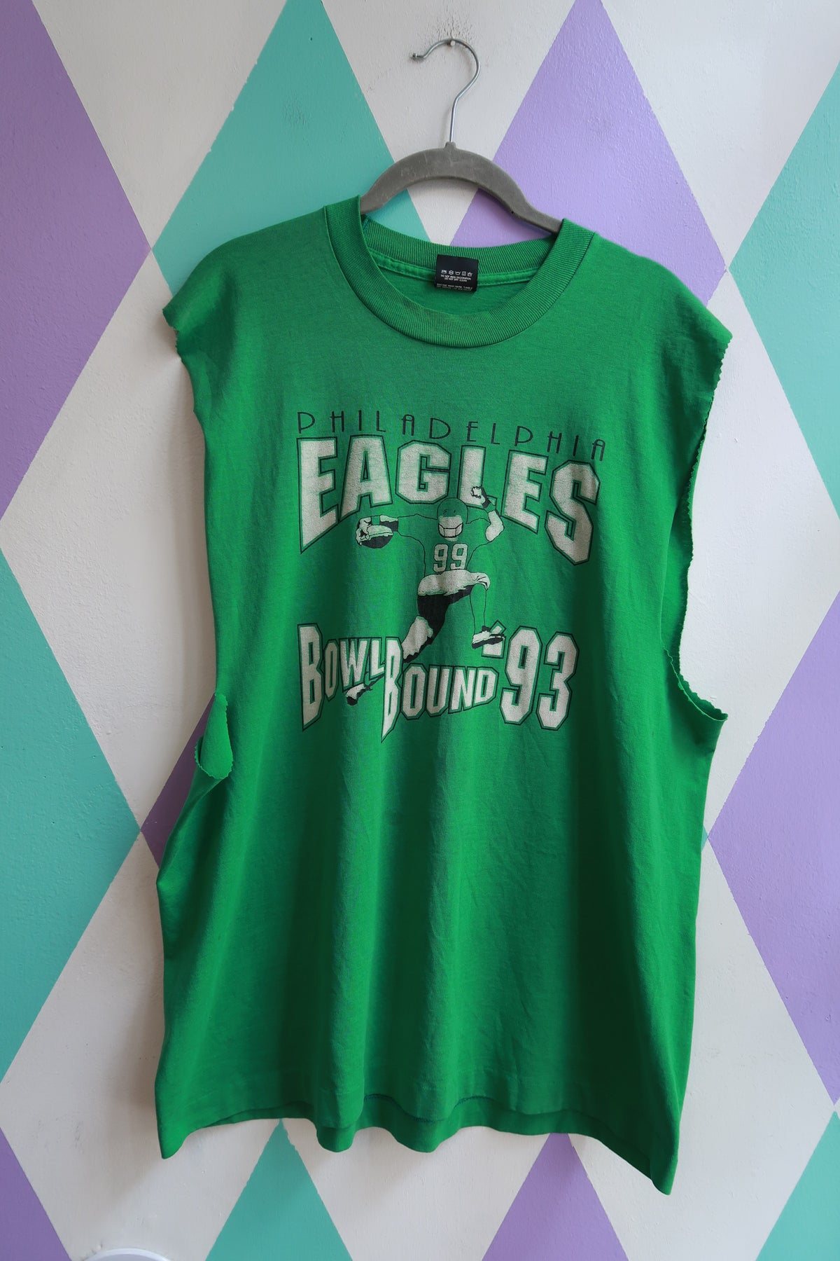 Elektra Vintage men's sleeveless graphic T-shirt featuring a 1993 Philadelphia Eagles Bowl Bound design, worn and casual style.