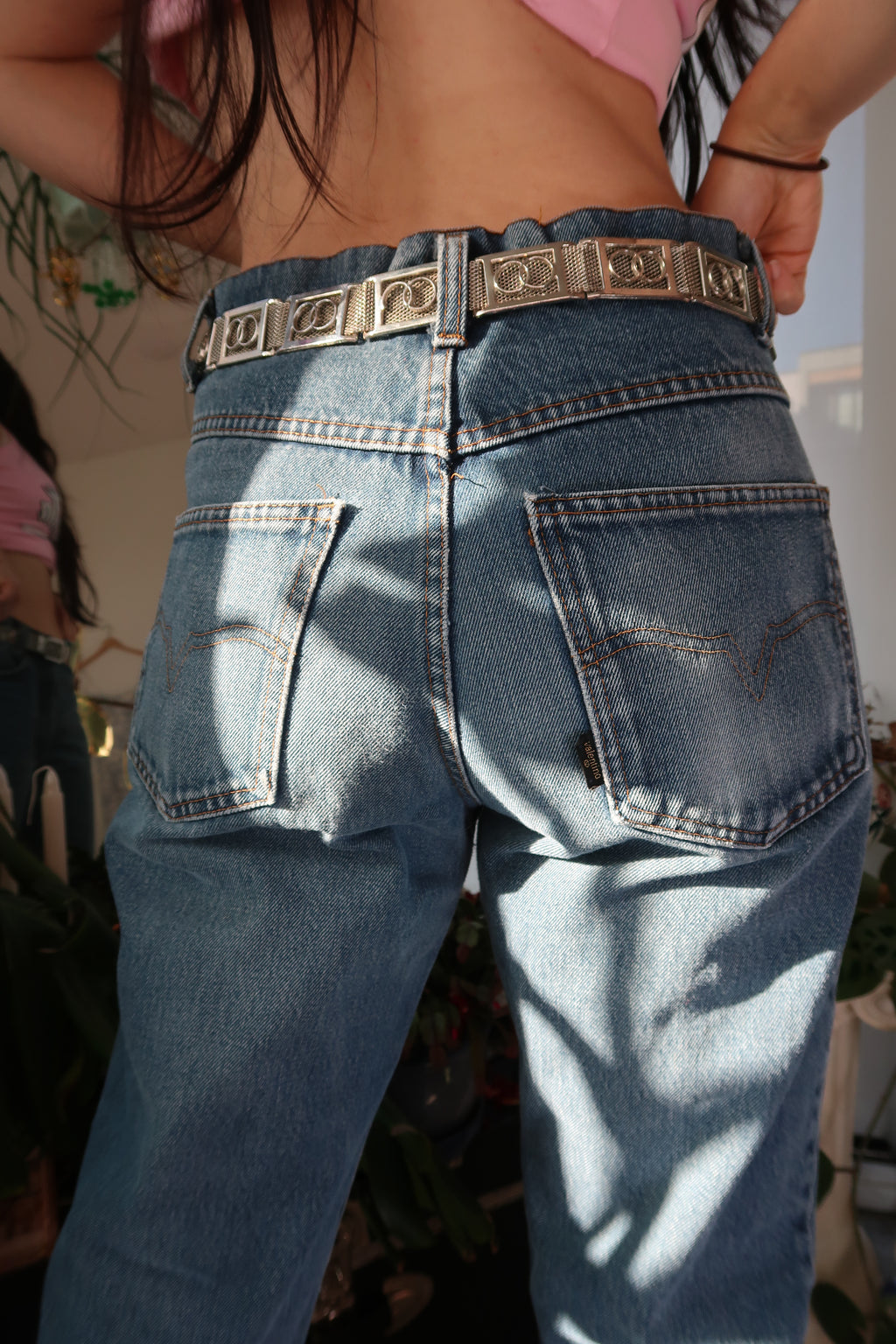Vintage chain mail metal mesh eyelet belt by Elektra Vintage, showing intricate metal links and eyelet details.