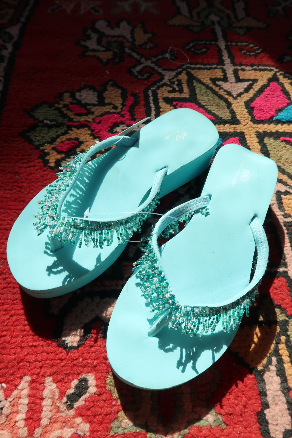 Elektra Vintage turquoise beaded Y2K vintage flip flops with beaded straps and flat soles, new with tags.