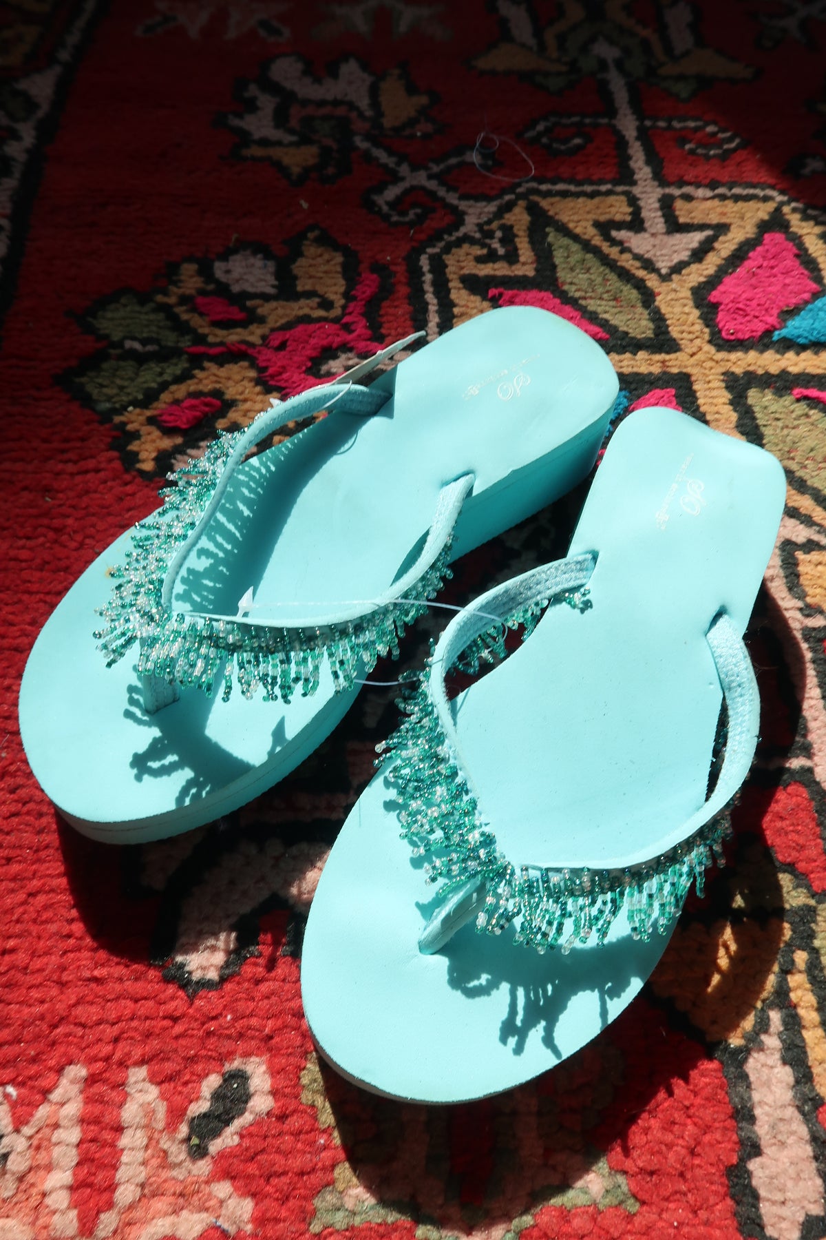 Elektra Vintage turquoise beaded Y2K vintage flip flops with beaded straps and flat soles, new with tags.