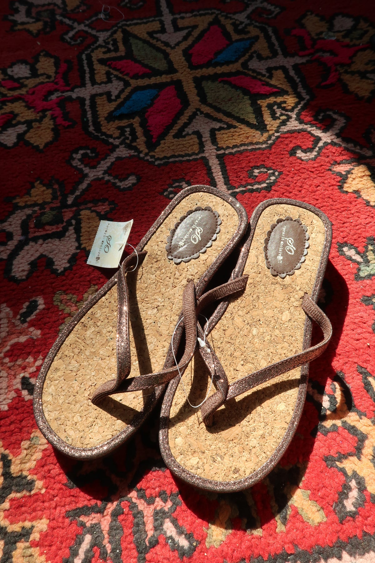 Brown Y2K glitter cork wedge flip flops from Elektra Vintage with tag, featuring sparkling straps and chunky cork soles.