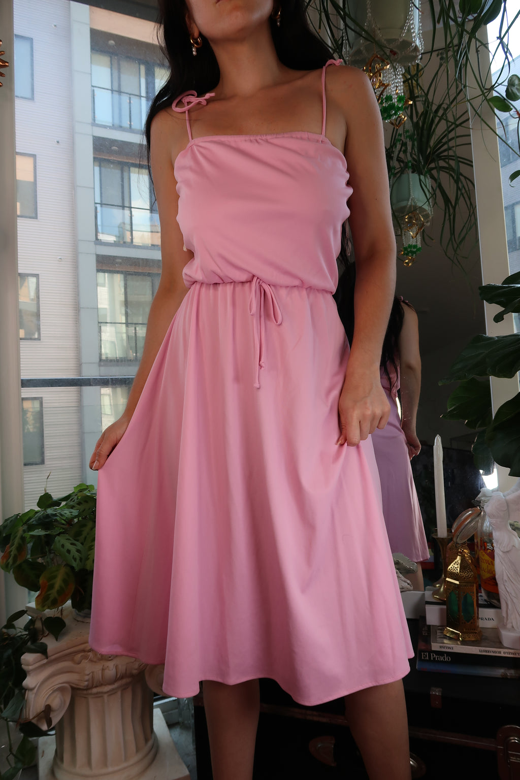 Vintage 1970s pink tie-strap midi dress by Elektra Vintage, soft jersey knit fabric with a flowing silhouette.