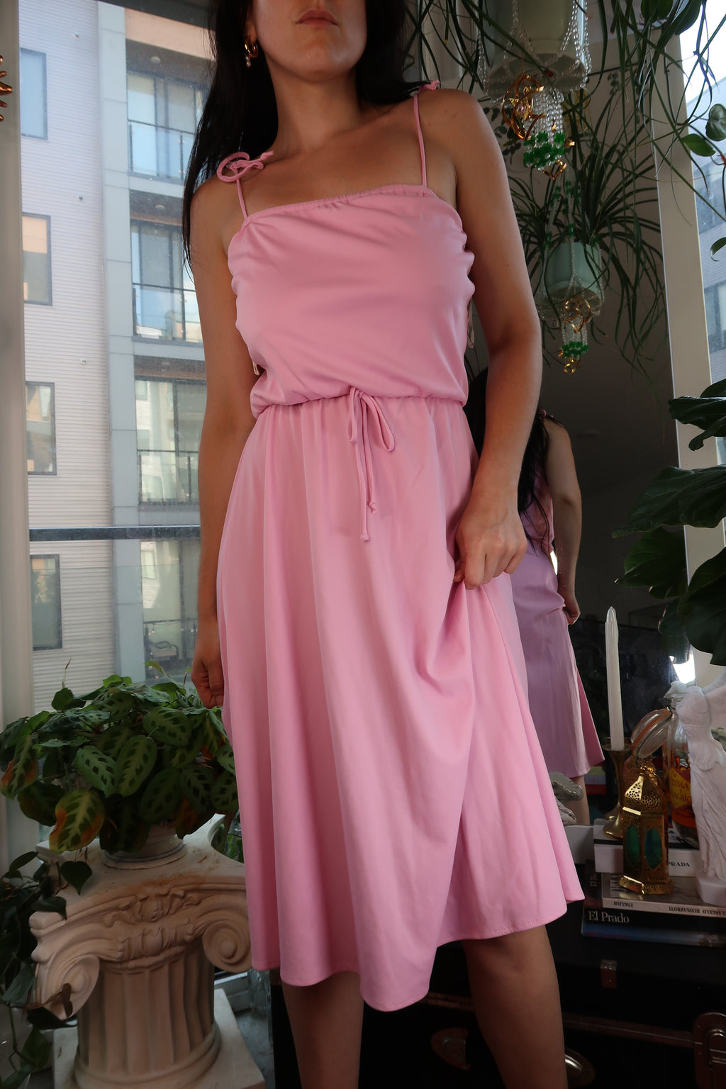 Pink vintage 1970s tie-strap midi dress by Elektra Vintage, soft jersey knit fabric, sleeveless design, casual retro style.