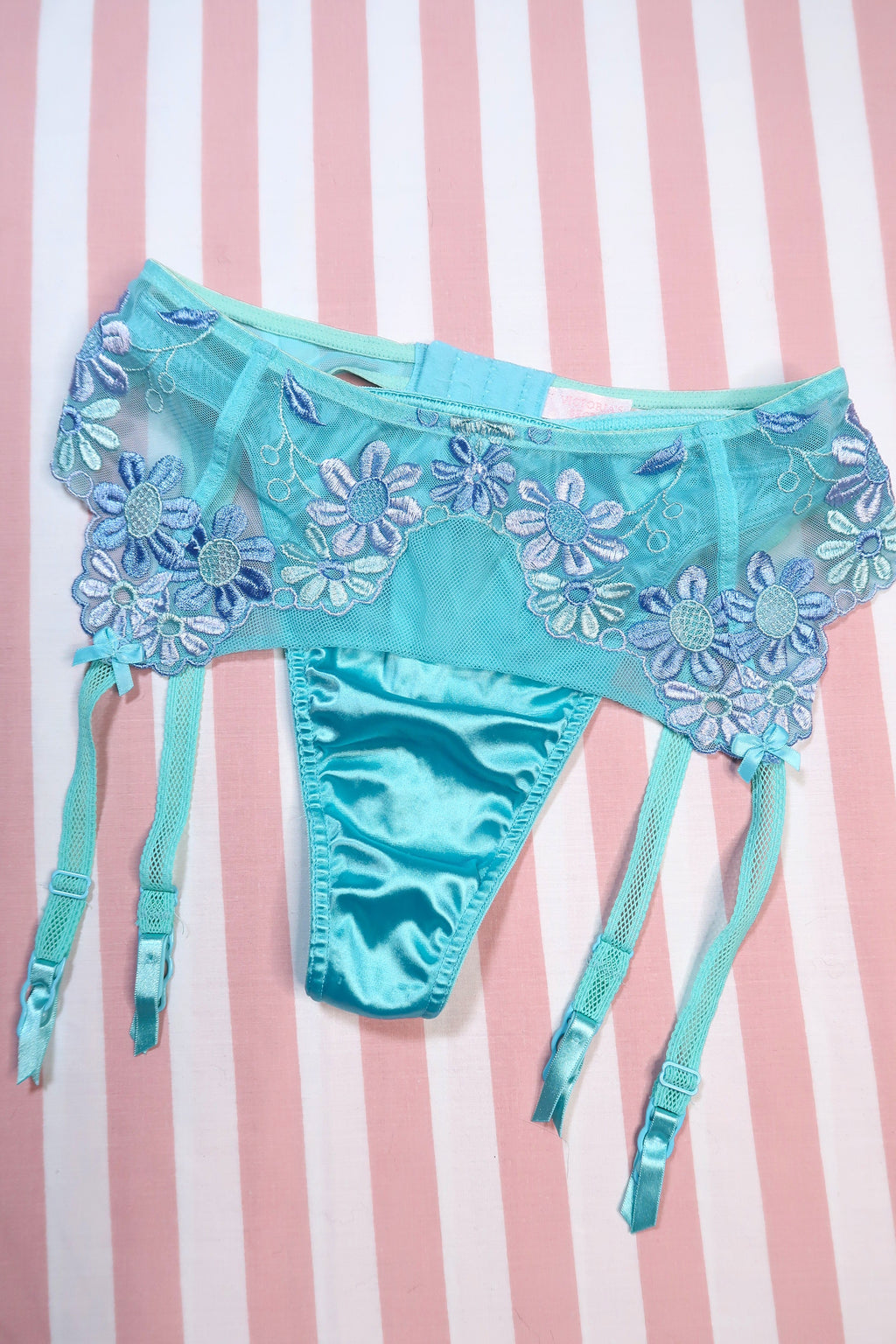 Vintage 2000s Victoria’s Secret aqua blue embroidered floral garter belt and matching satin thong lingerie set by Elektra Vintage.