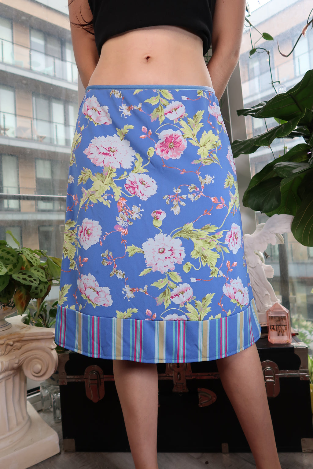 Vintage 2000s GAP blue floral A-line skirt with striped hem, styled by Elektra Vintage, showcasing Y2K fashion details.