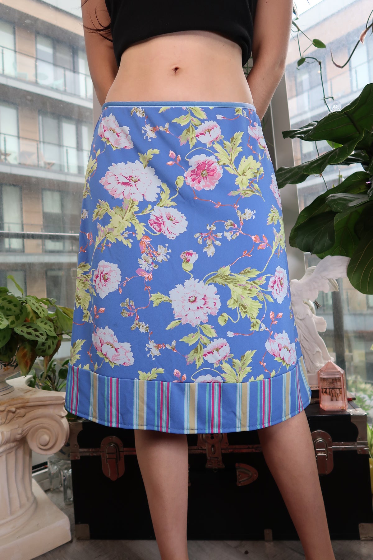Vintage 2000s GAP blue floral A-line skirt with striped hem, styled by Elektra Vintage, showcasing Y2K fashion details.
