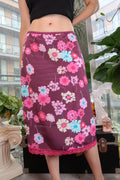 Vintage Y2K floral print slip skirt with lace hem by Elektra Vintage, featuring a flowy design and vibrant floral pattern.